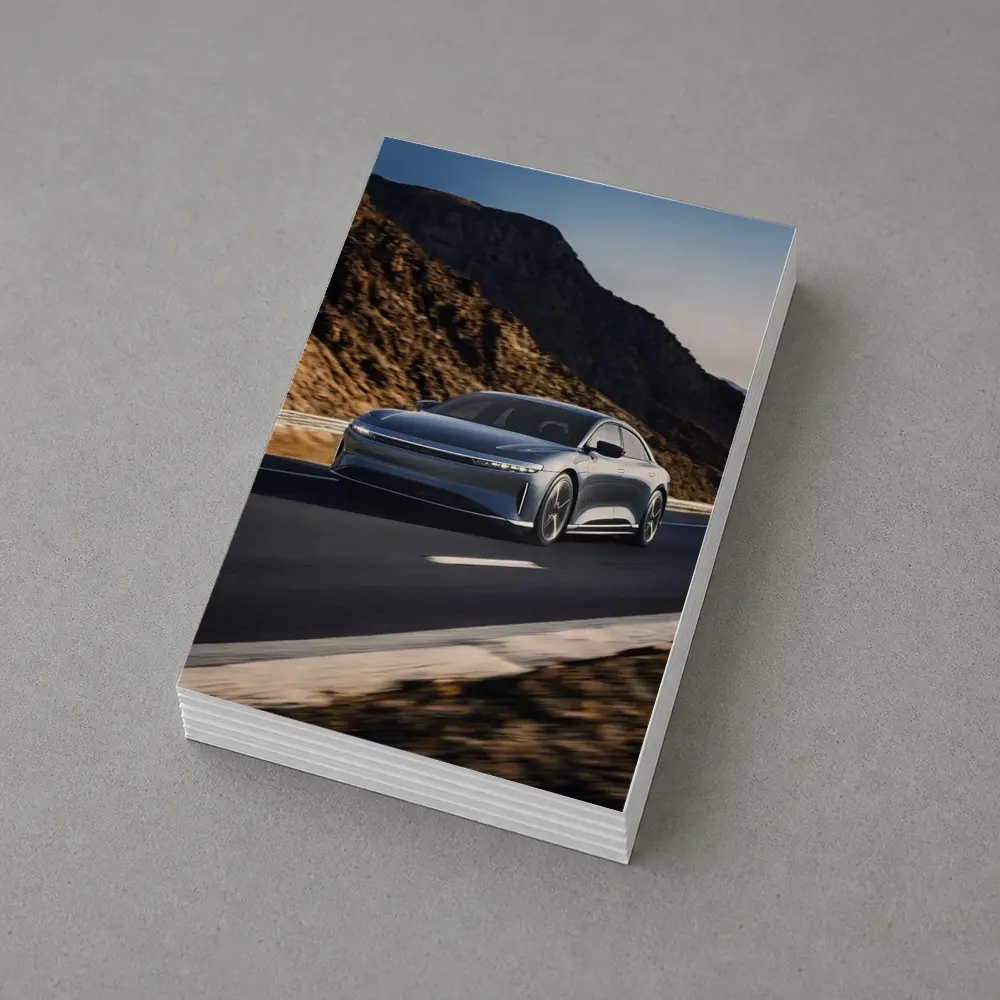 Lucid Air Speeding Through Rocky Mountain Road – Postcards