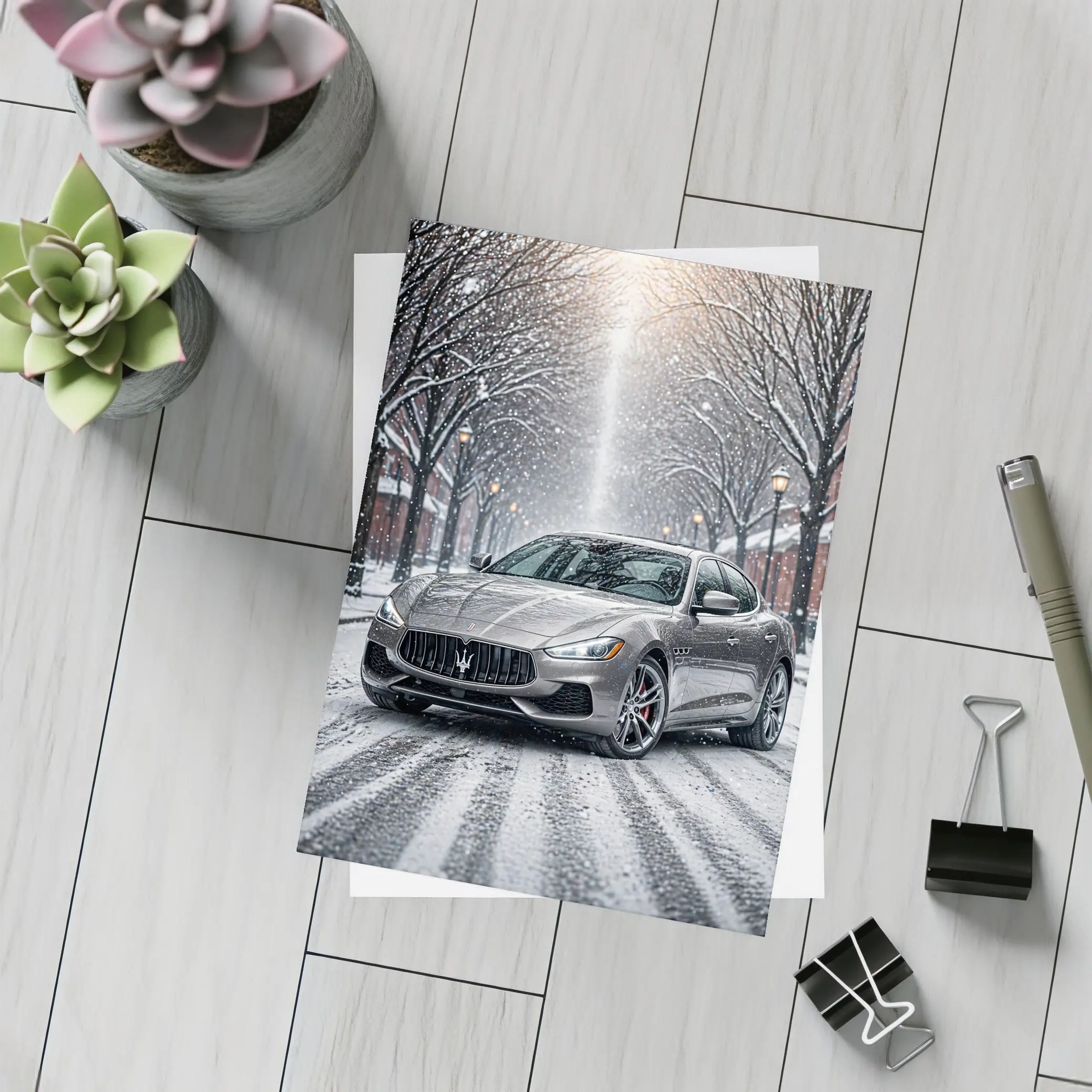 Maserati Quattroporte Driving Through Snowy Street – Postcards