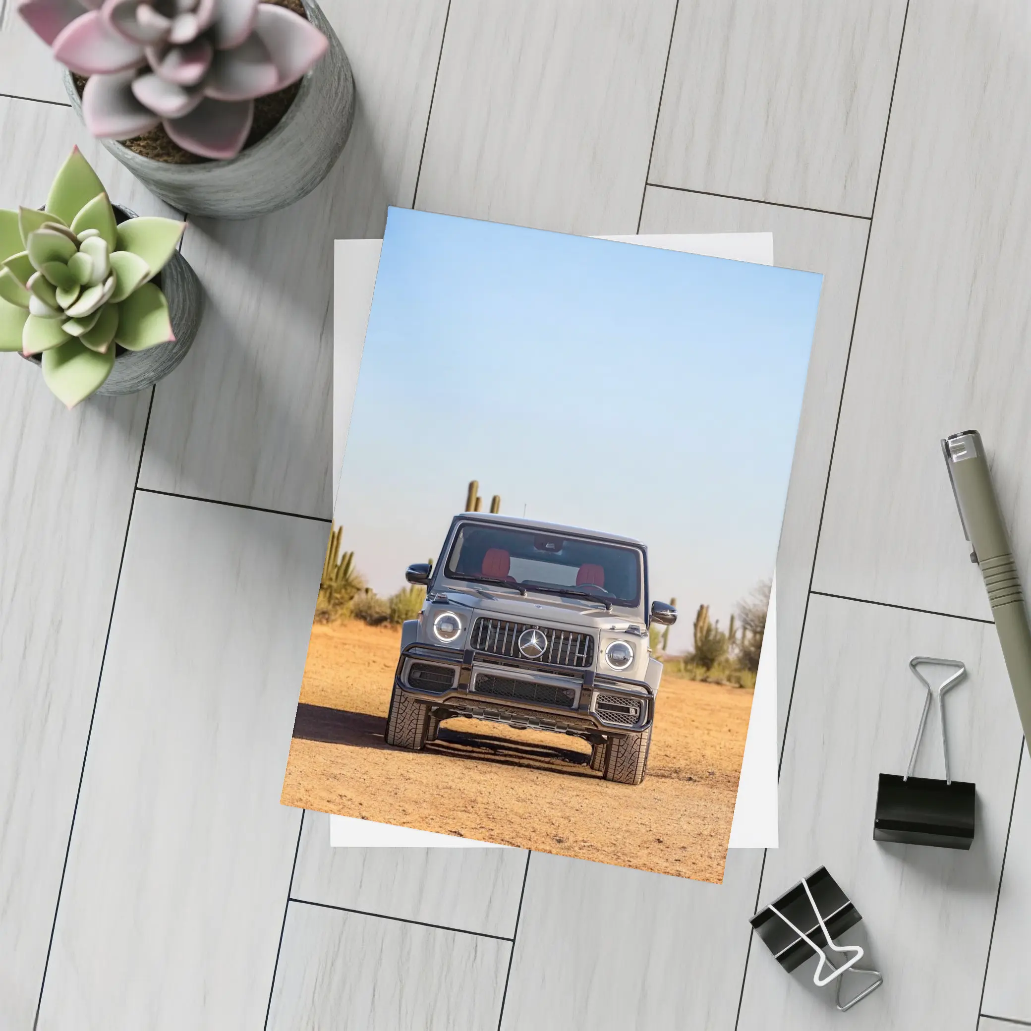 Mercedes AMG G63 Silver Desert Front View – Postcards
