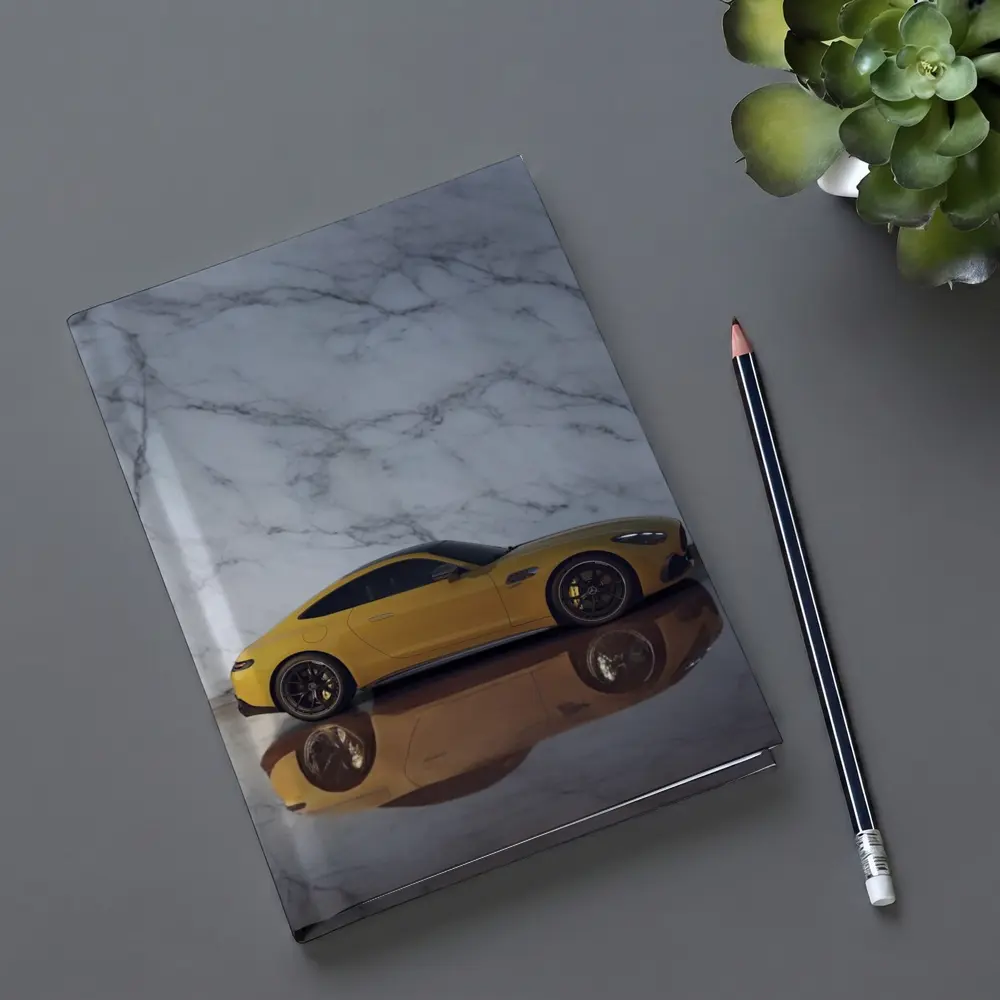 Mercedes AMG GT Yellow Against Marble Wall – Notebooks