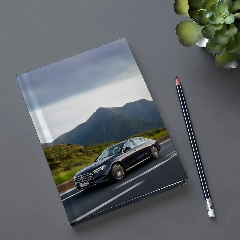 Mercedes E-Class Driving Through Mountain Road – Notebooks