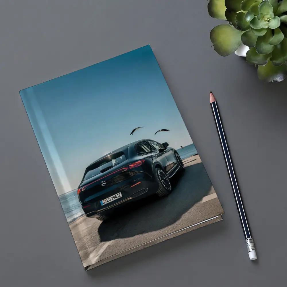 Mercedes EQC SUV Parked by Coastal Road – Notebooks