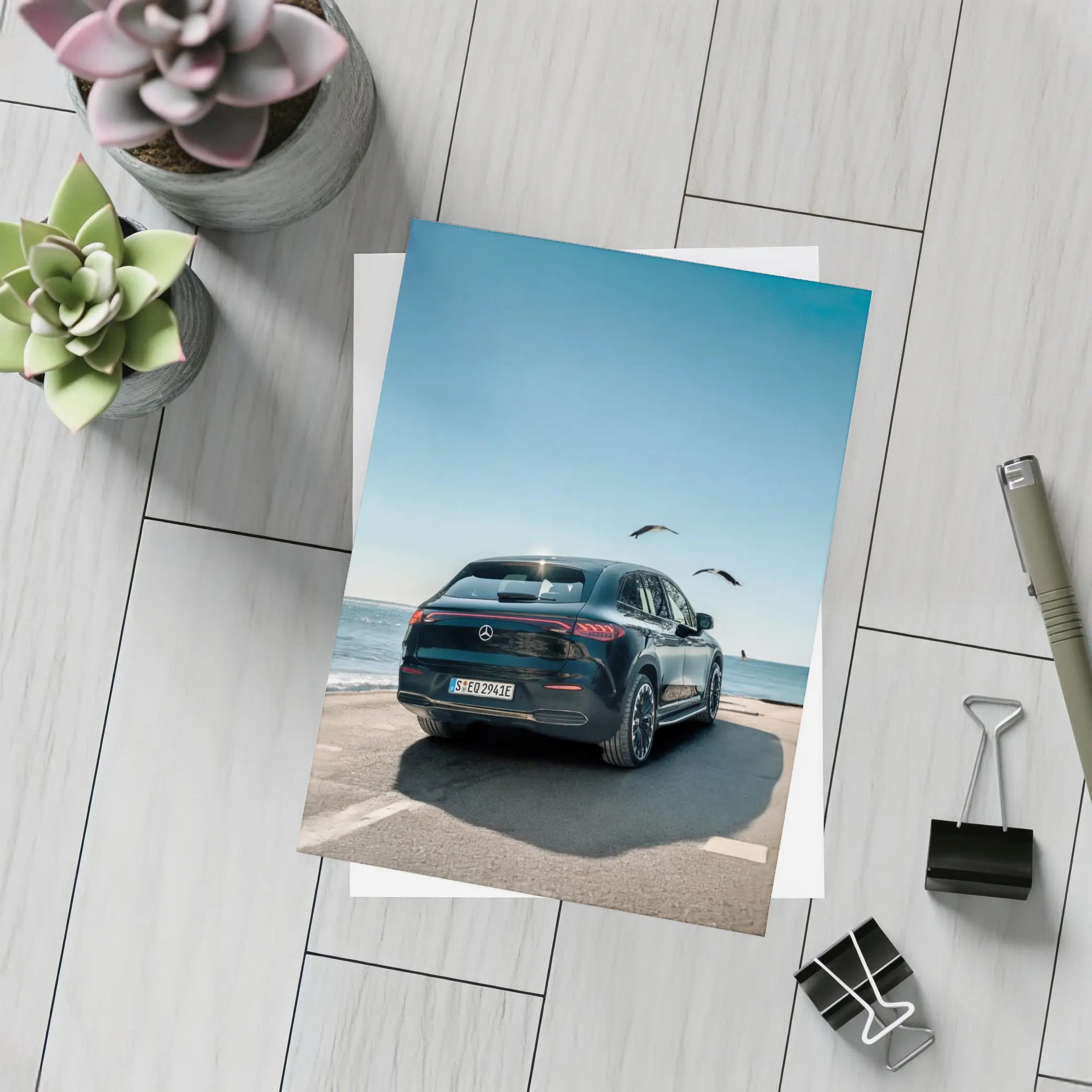 Mercedes EQC SUV Parked by Coastal Road – Postcards