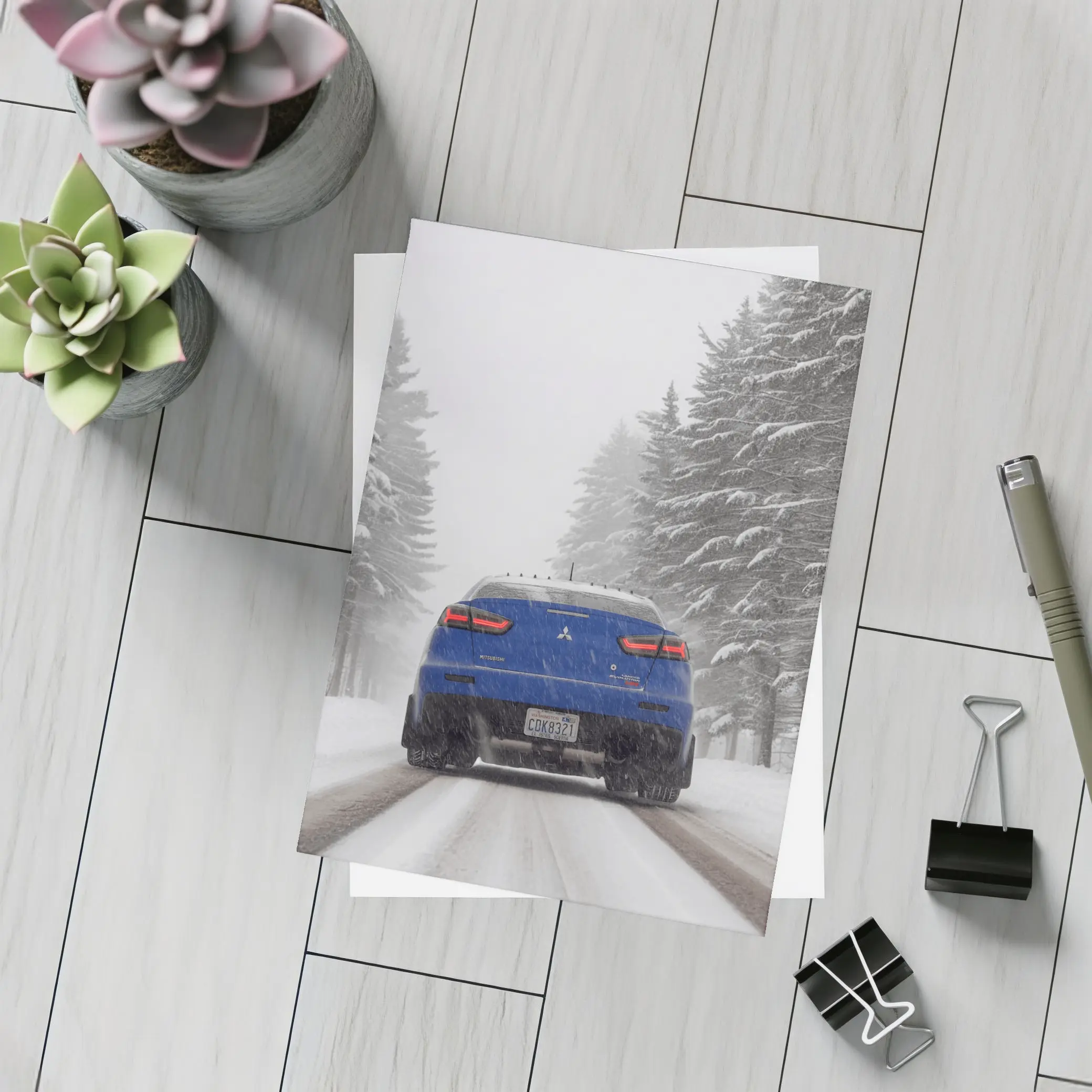 Mitsubishi Lancer Blue Driving Snowy Winter Road – Postcards