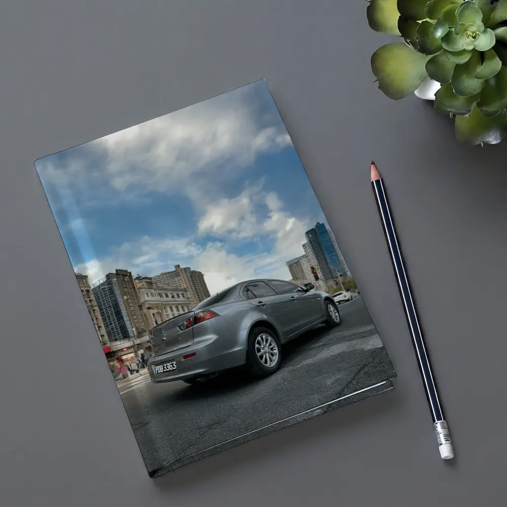 Mitsubishi Lancer Gray Sedan City Street – Notebooks