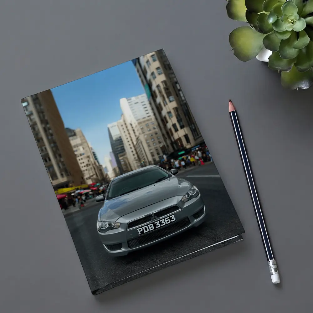 Mitsubishi Lancer Gray City Street Front View – Notebooks