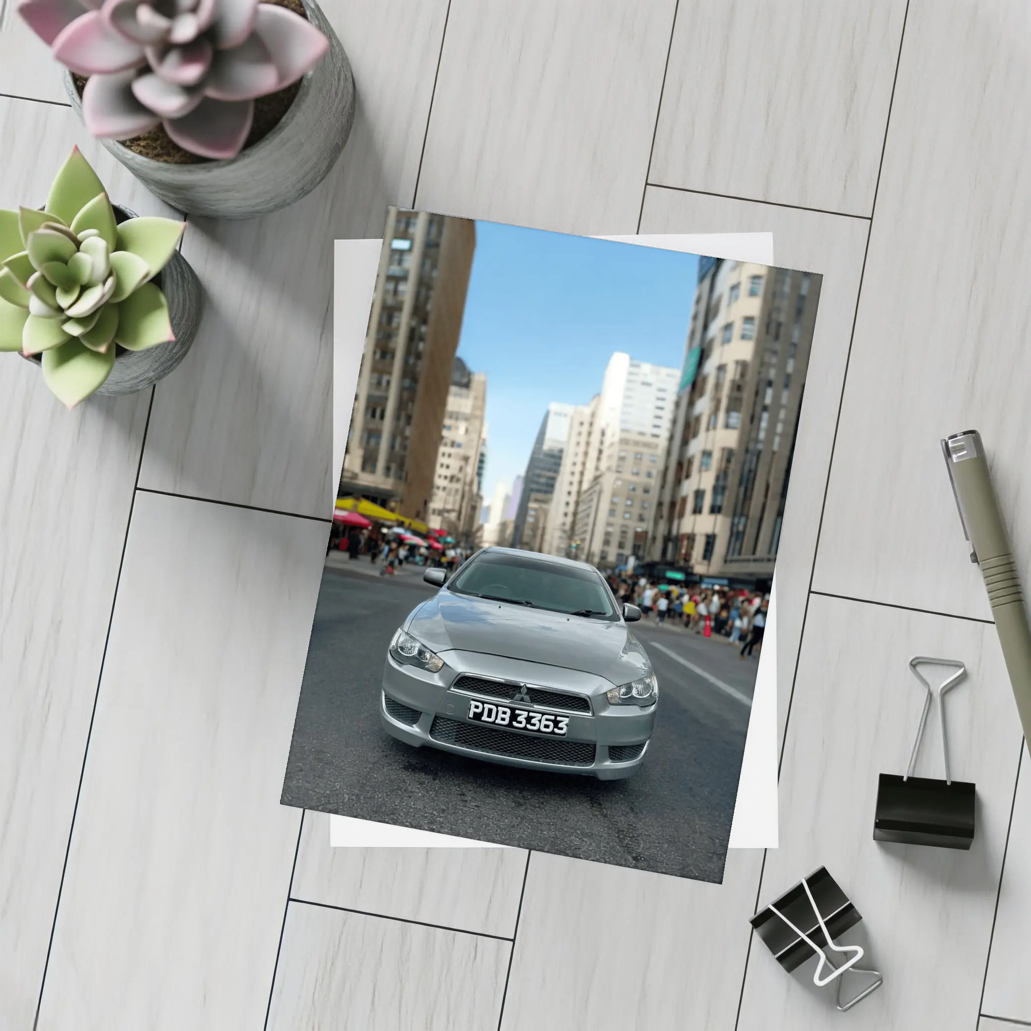 Mitsubishi Lancer Gray City Street Front View – Postcards