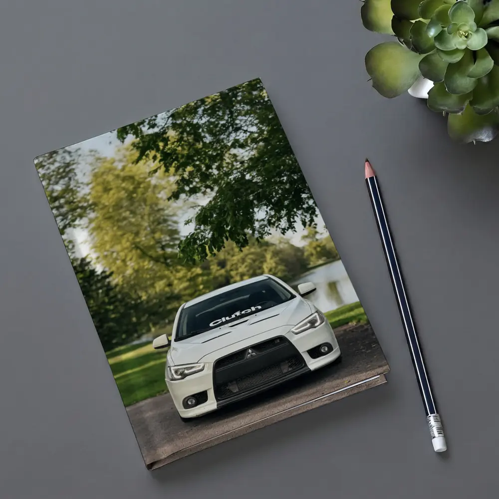 Mitsubishi Lancer Evolution White Park Setting – Notebooks