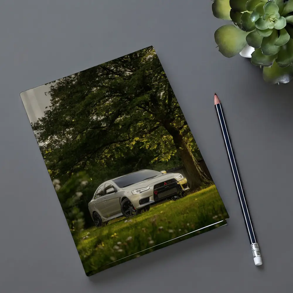 Mitsubishi Lancer Evolution Parked Under Green Trees – Notebooks