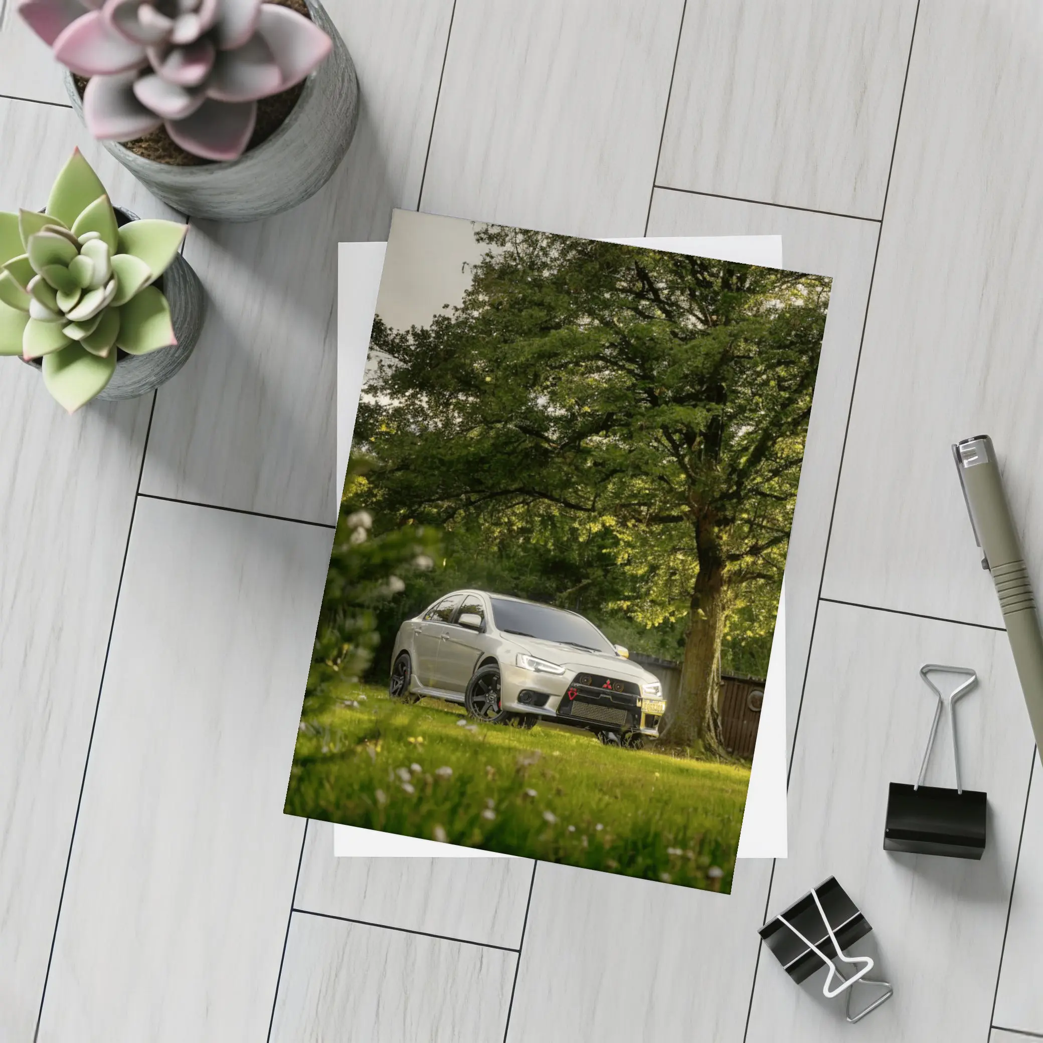 Mitsubishi Lancer Evolution Parked Under Green Trees – Postcards