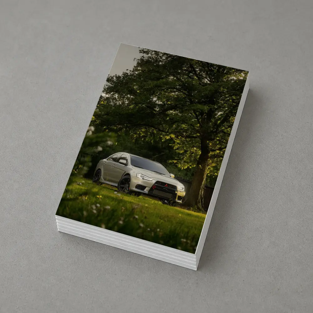 Mitsubishi Lancer Evolution Parked Under Green Trees – Postcards