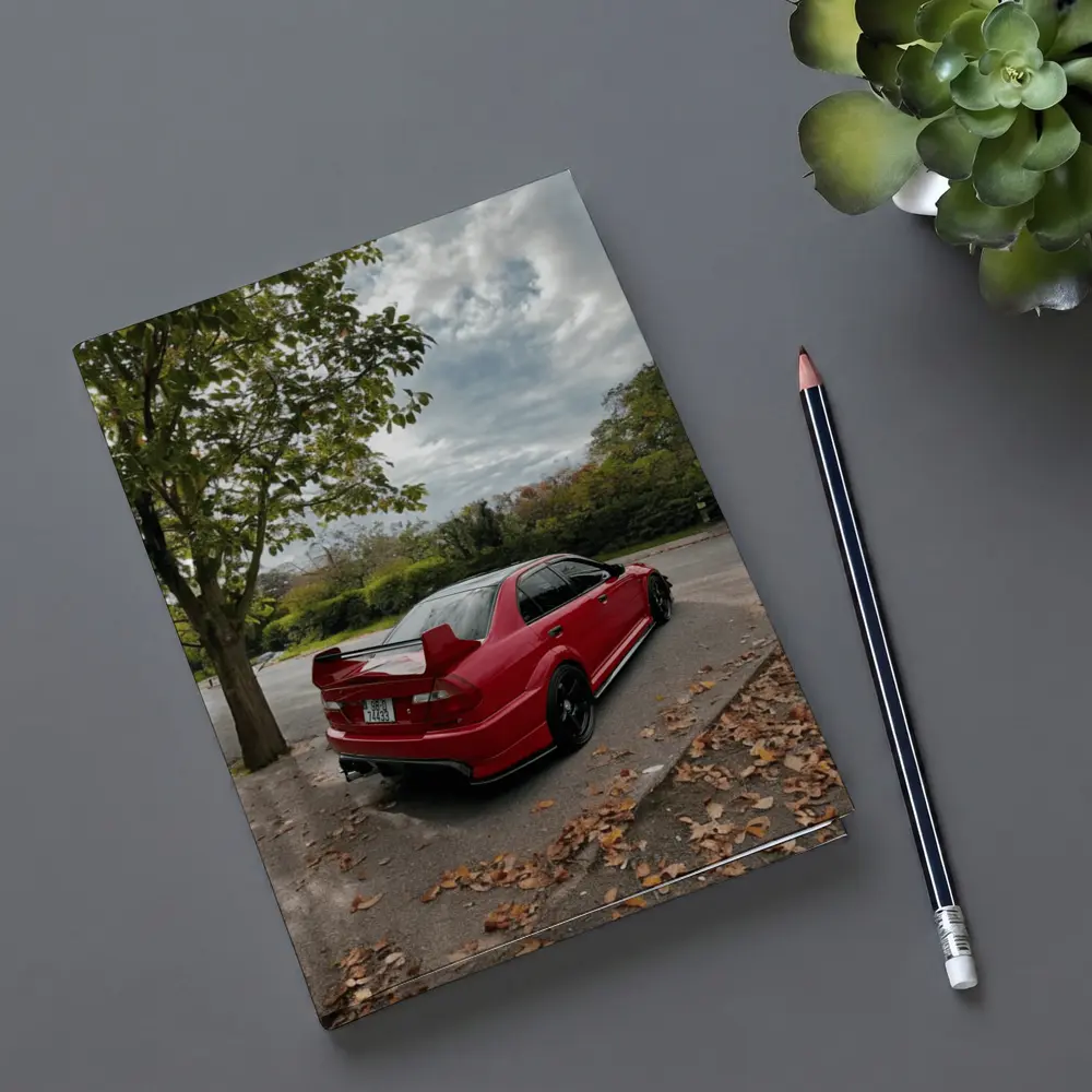 Red Mitsubishi Lancer Evolution Street Parking – Notebooks