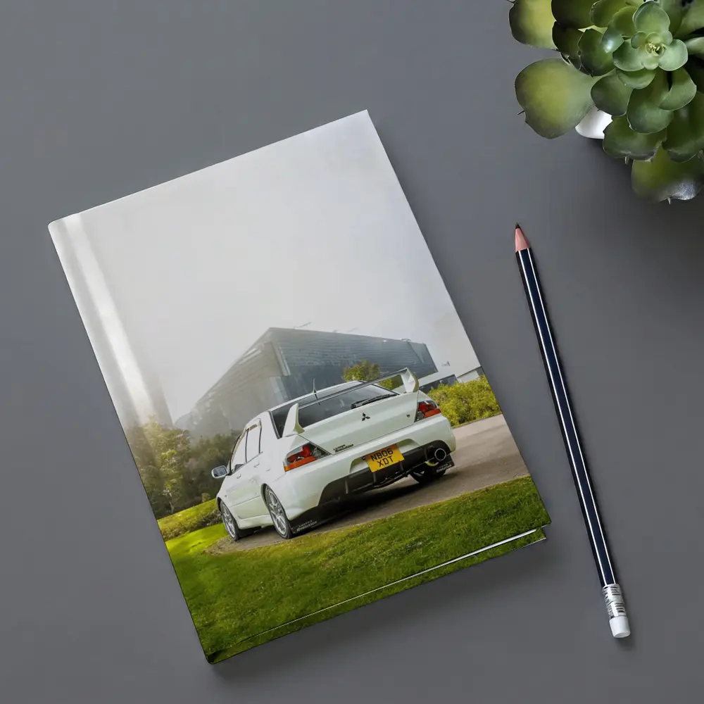 Mitsubishi Lancer Evolution White City Background – Notebooks