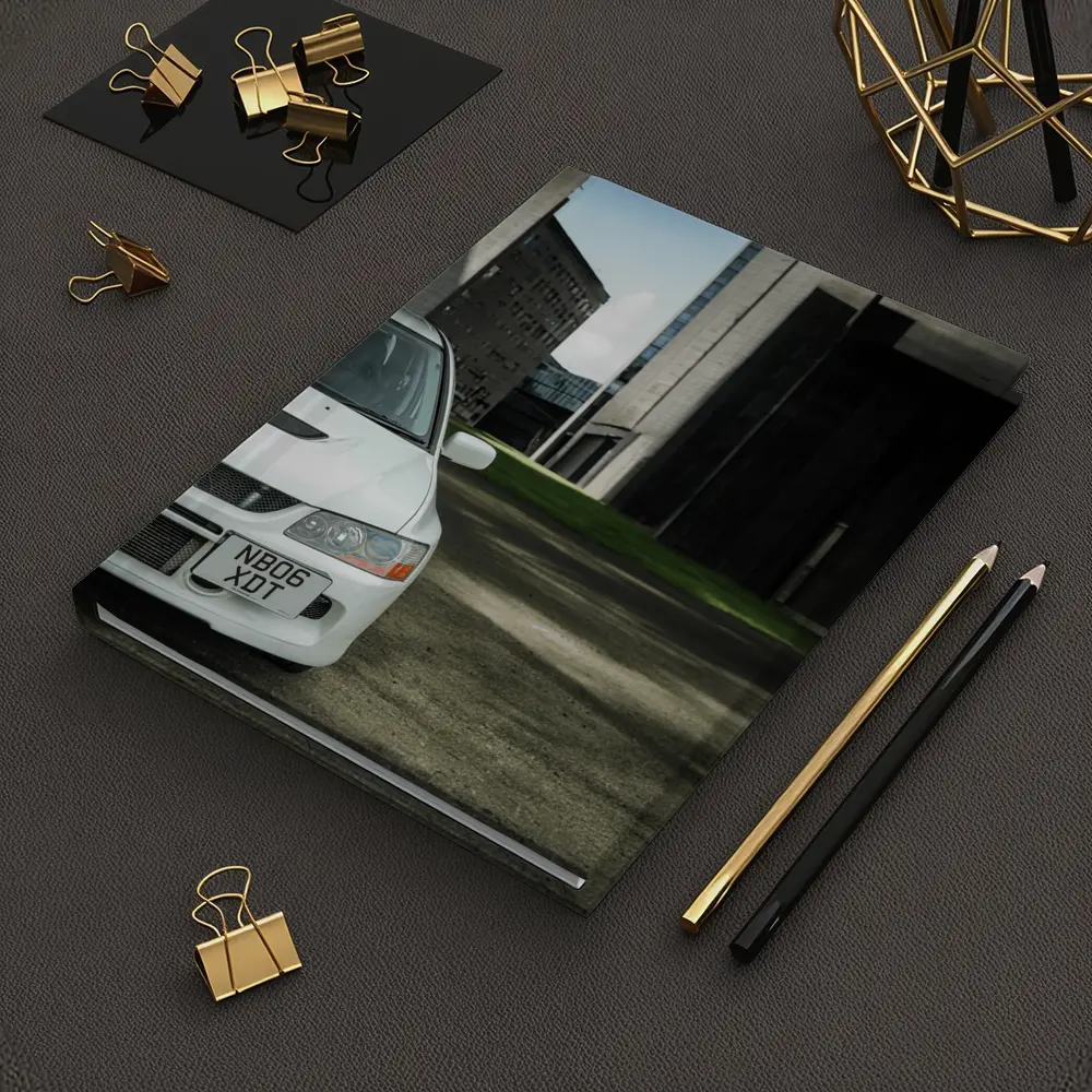 Mitsubishi Lancer Evo White Urban Setting – Notebooks
