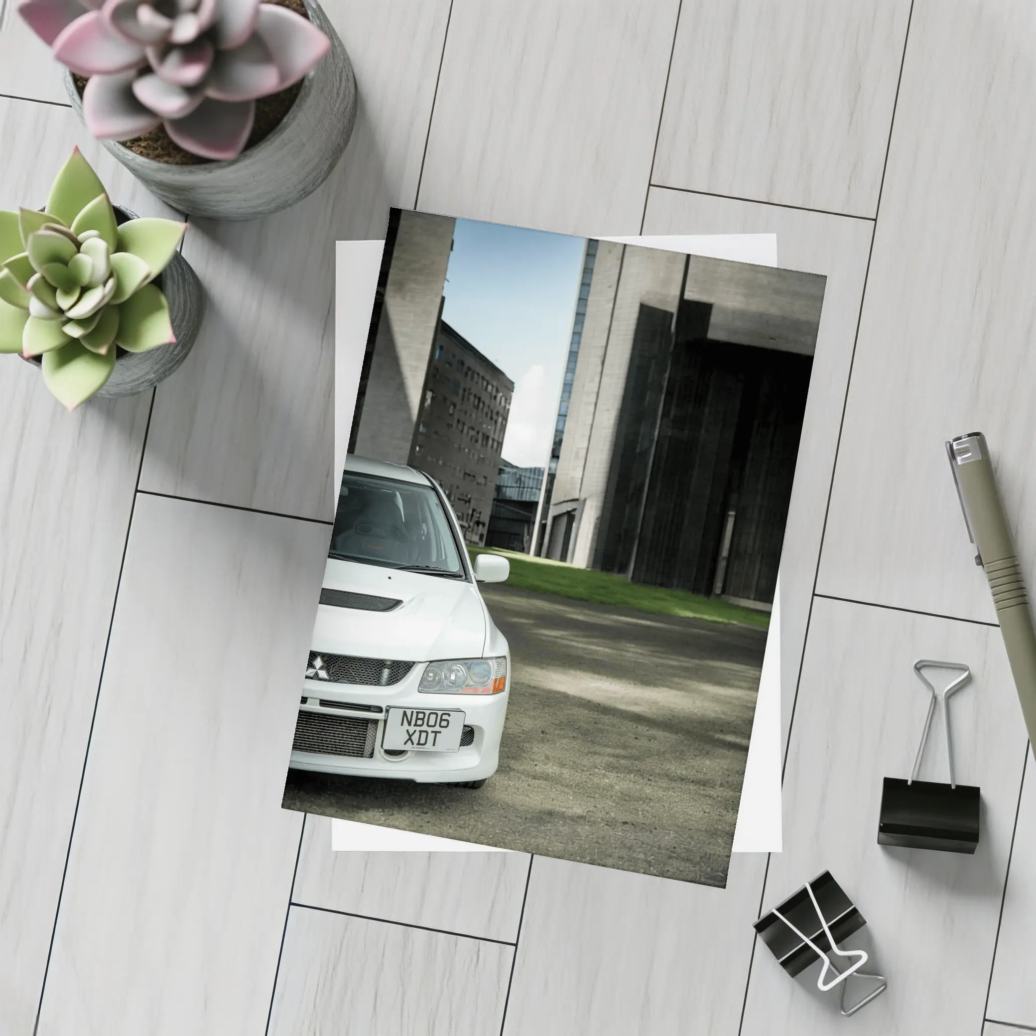 Mitsubishi Lancer Evo White Urban Setting – Postcards