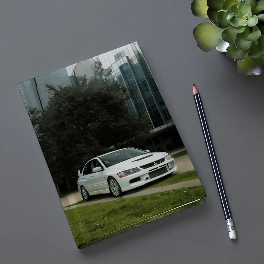 Mitsubishi Lancer Evolution White Urban City – Notebooks