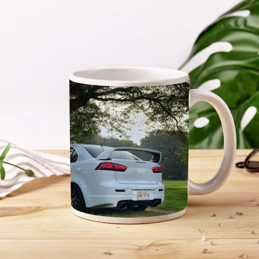 Mitsubishi Lancer White Parked Under Green Trees – Mugs