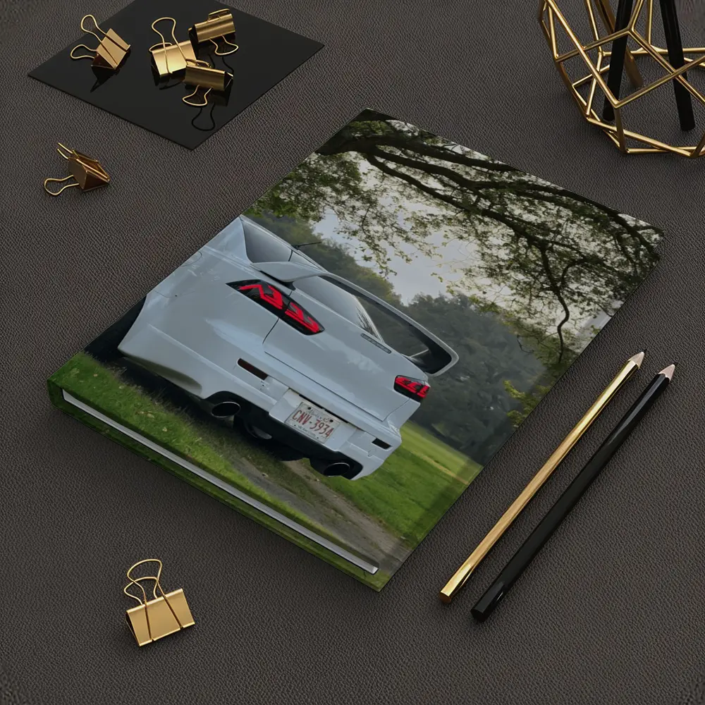 Mitsubishi Lancer White Parked Under Green Trees – Notebooks