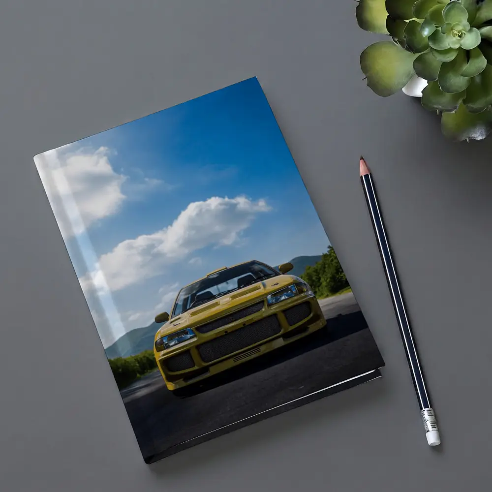 Yellow Mitsubishi Lancer Evo Open Road – Notebooks
