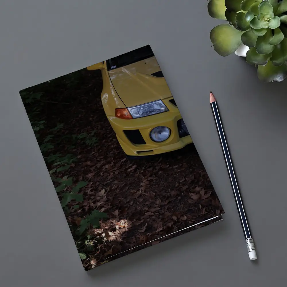 Yellow Mitsubishi Lancer Evolution Forest Trail – Notebooks