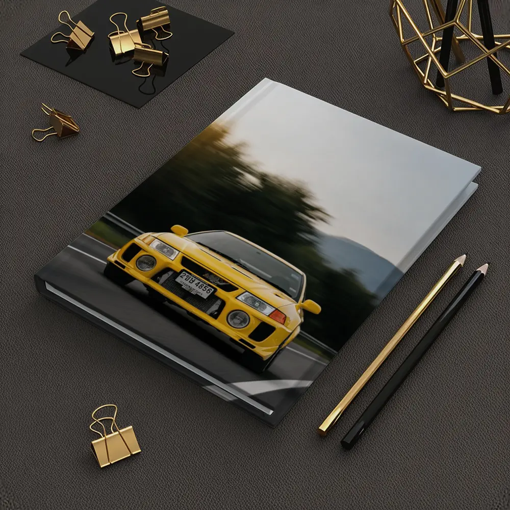 Yellow Mitsubishi Lancer Evolution On Mountain Road – Notebooks