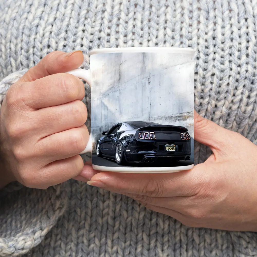 Black Ford Mustang Against Concrete Wall – Mugs