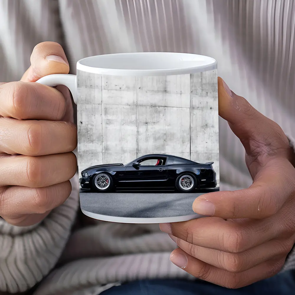 Black Ford Mustang Against Concrete Wall – Mugs