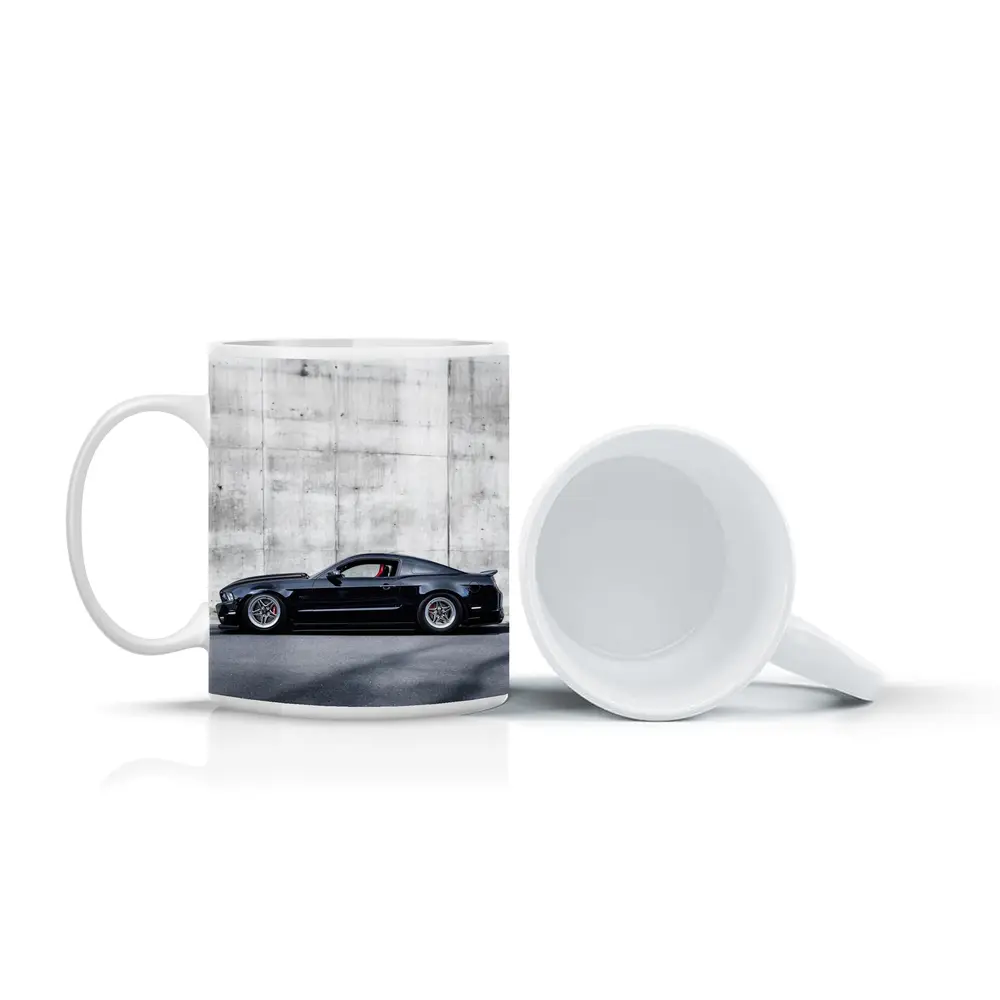 Black Ford Mustang Against Concrete Wall – Mugs
