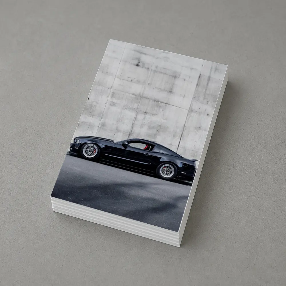 Black Ford Mustang Against Concrete Wall – Postcards