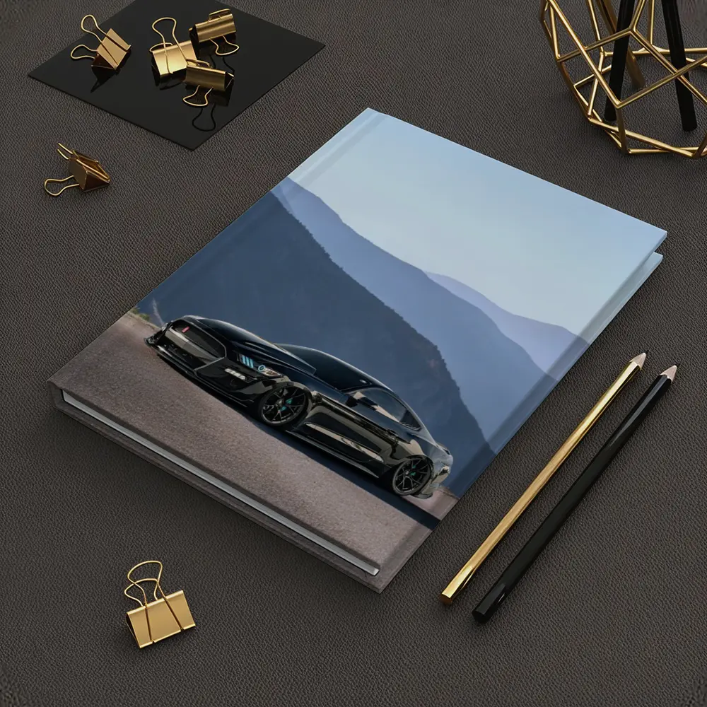 Black Ford Mustang Parked Against Mountain Backdrop – Notebooks