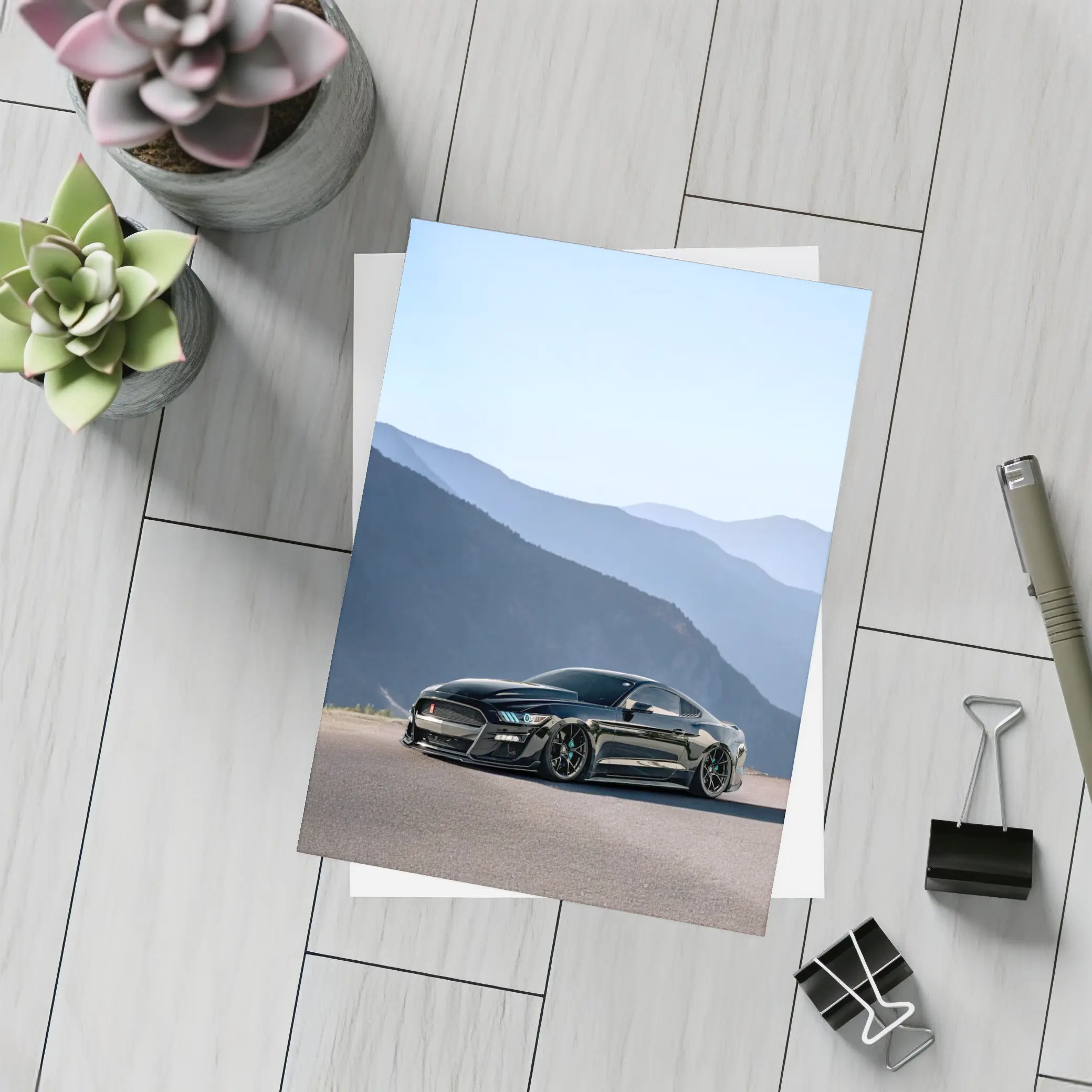 Black Ford Mustang Parked Against Mountain Backdrop – Postcards