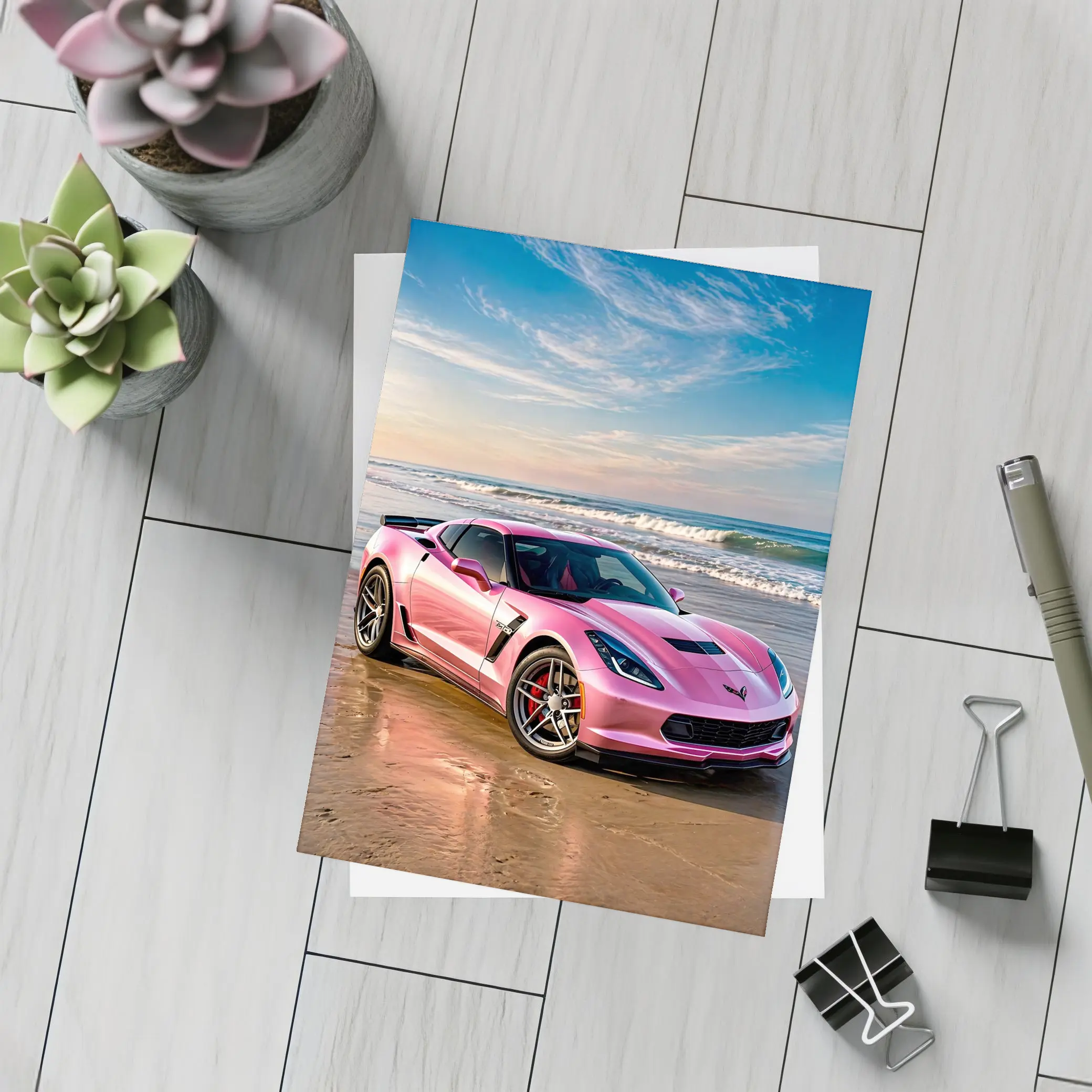 Pink Chevrolet Corvette Parked On Beach – Postcards