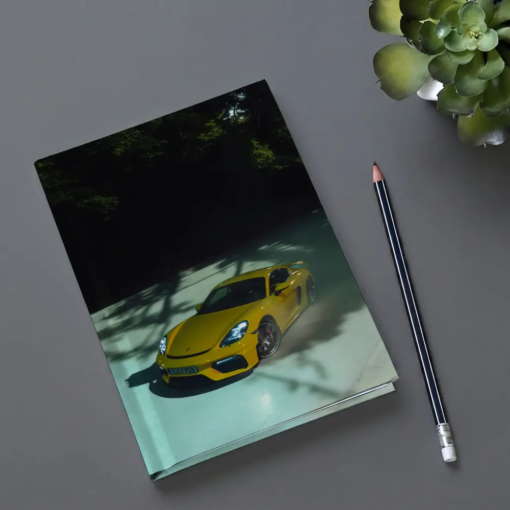 Porsche Cayman GT4 Yellow On Track – Notebooks