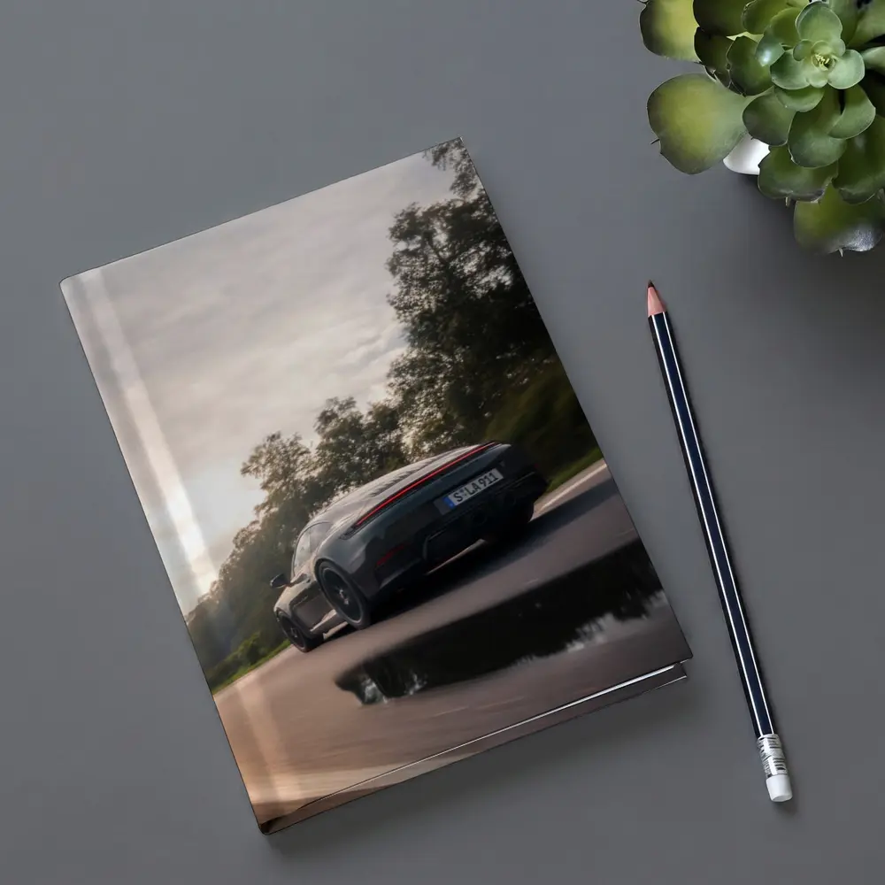 Porsche 911 GTS Speeding Down Open Road – Notebooks
