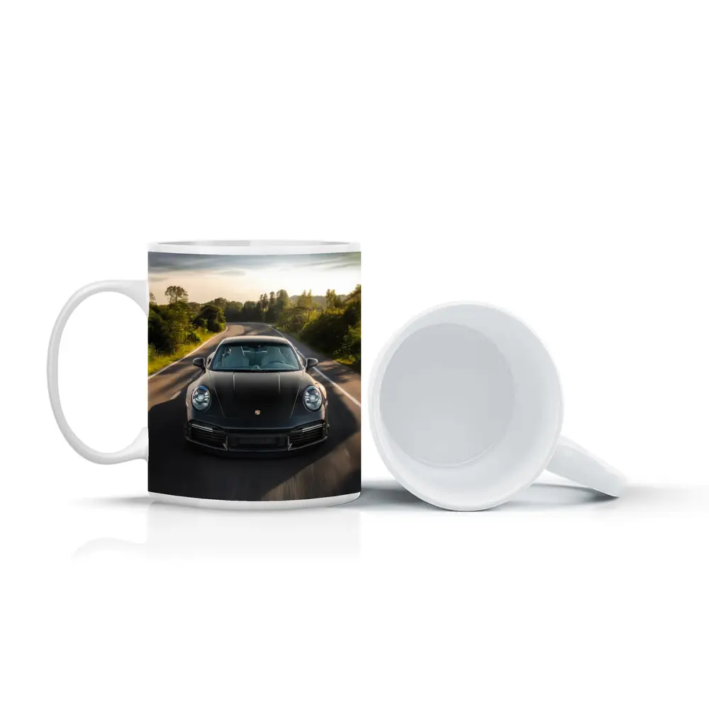 Black Porsche 911 Driving Open Road – Mugs
