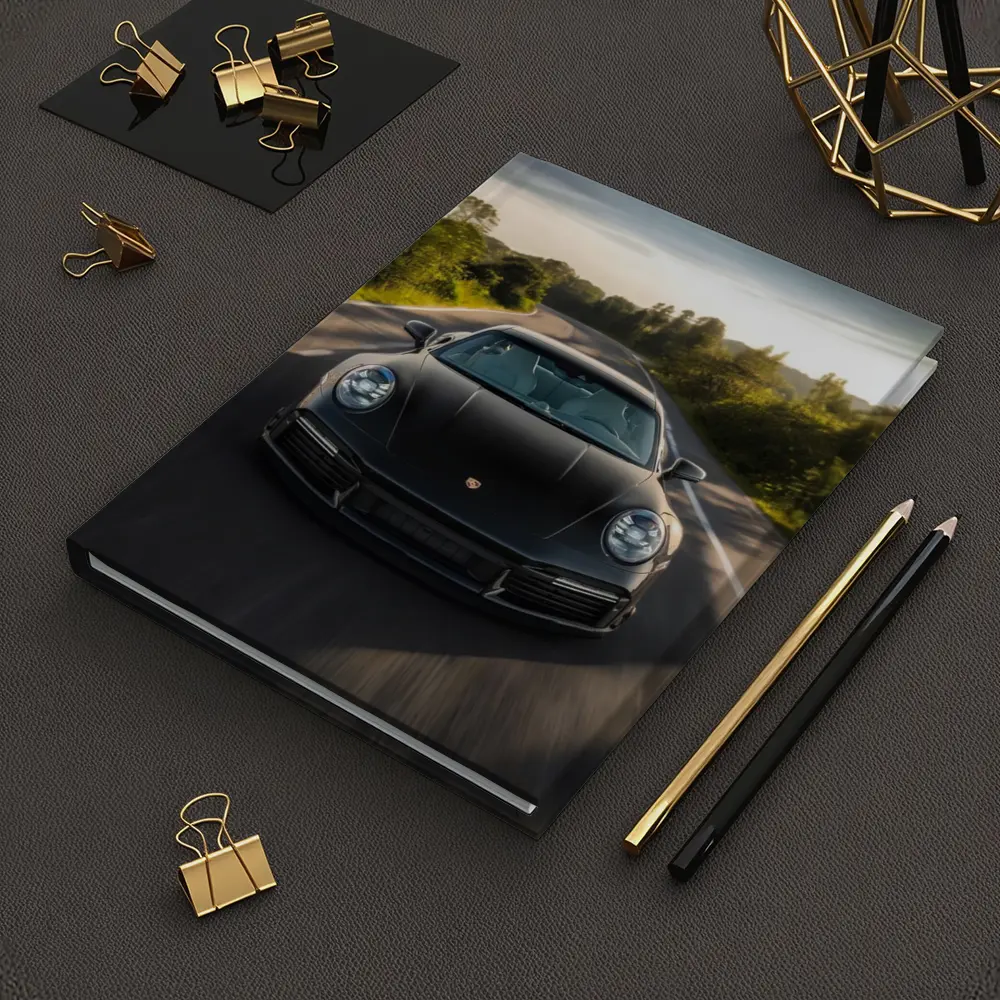 Black Porsche 911 Driving Open Road – Notebooks