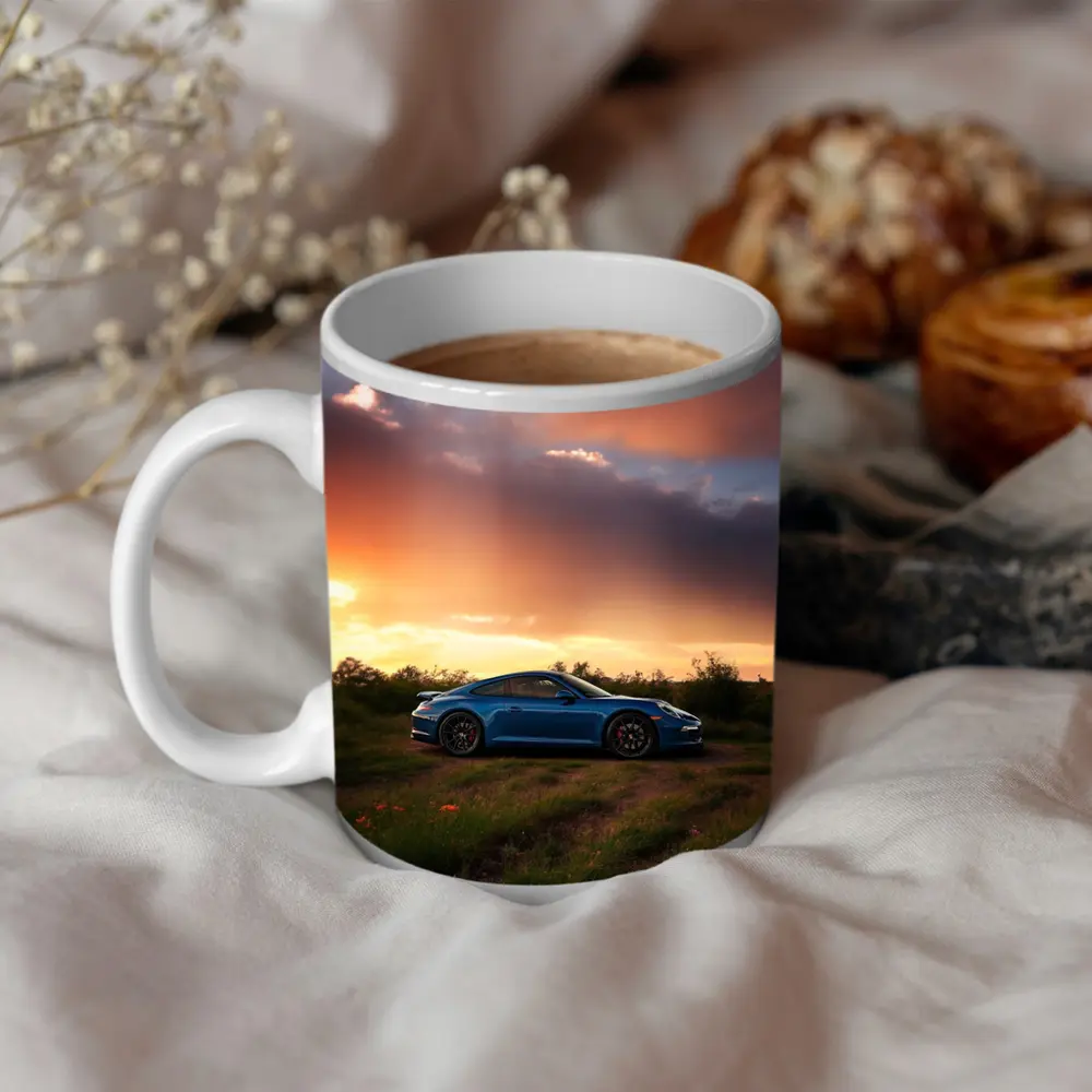 Blue Porsche 911 Parked at Dramatic Sunset – Mugs