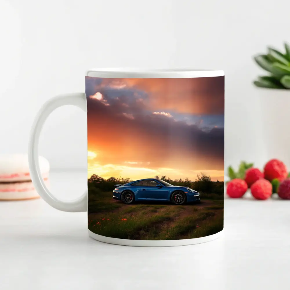 Blue Porsche 911 Parked at Dramatic Sunset – Mugs
