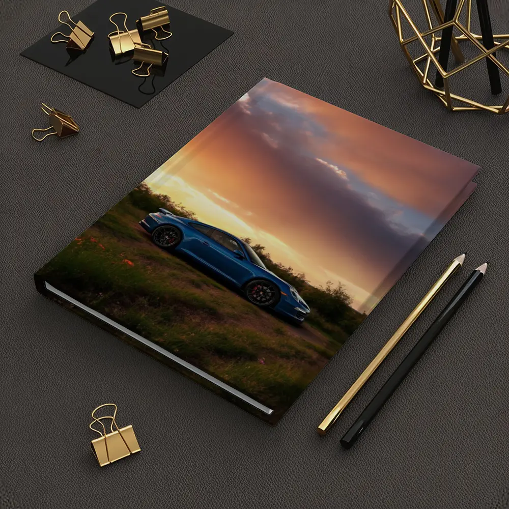 Blue Porsche 911 Parked at Dramatic Sunset – Notebooks