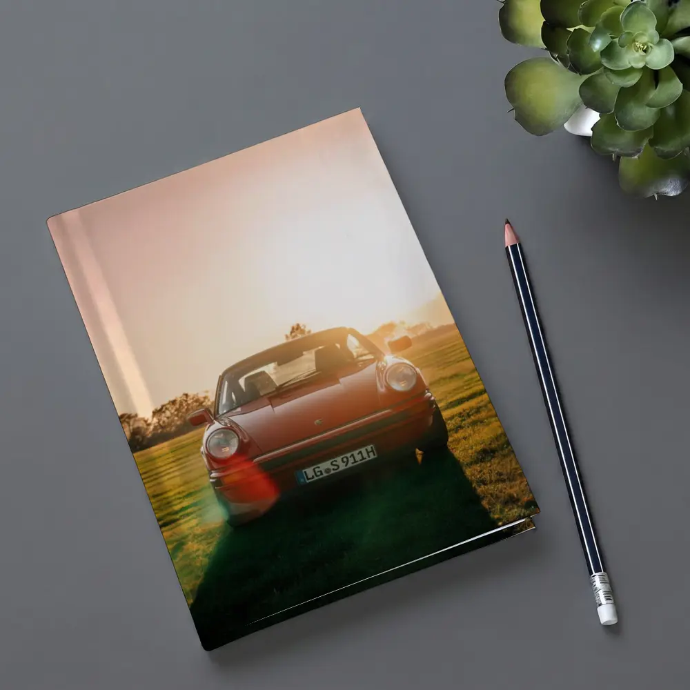 Porsche 911 Classic Red Sunset Field – Notebooks