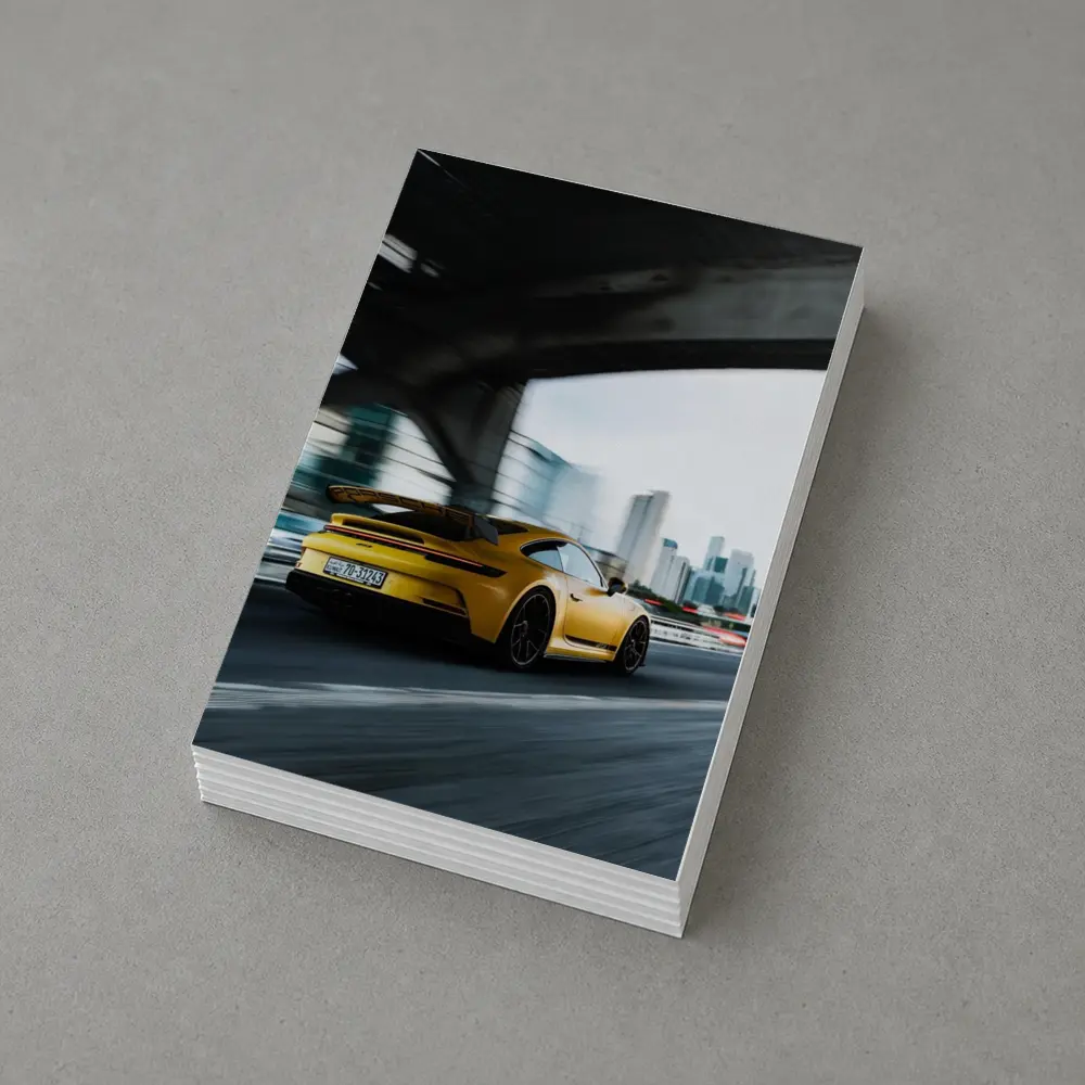 Yellow Porsche GT3 Racing Through City – Postcards