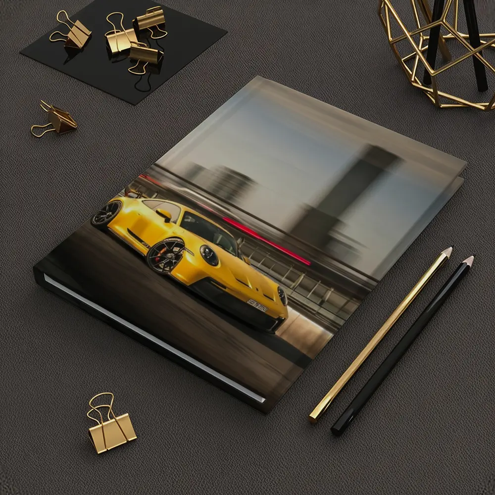 Yellow Porsche GT3 Racing Through City Streets – Notebooks