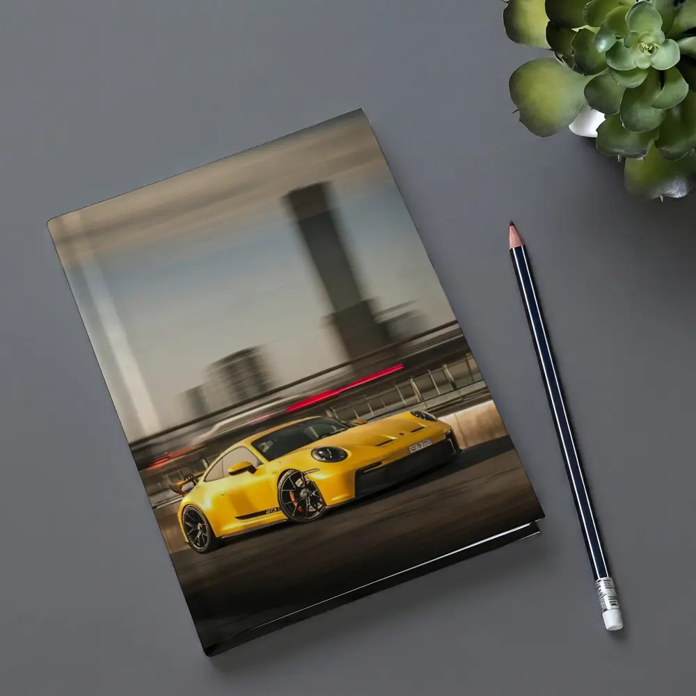 Yellow Porsche GT3 Racing Through City Streets – Notebooks
