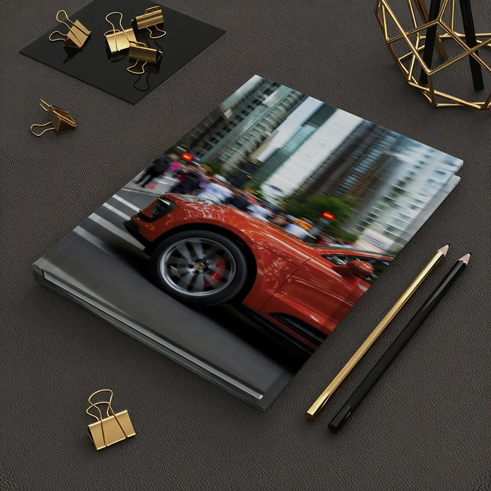 Porsche Macan Orange Speeding Through City Streets – Notebooks