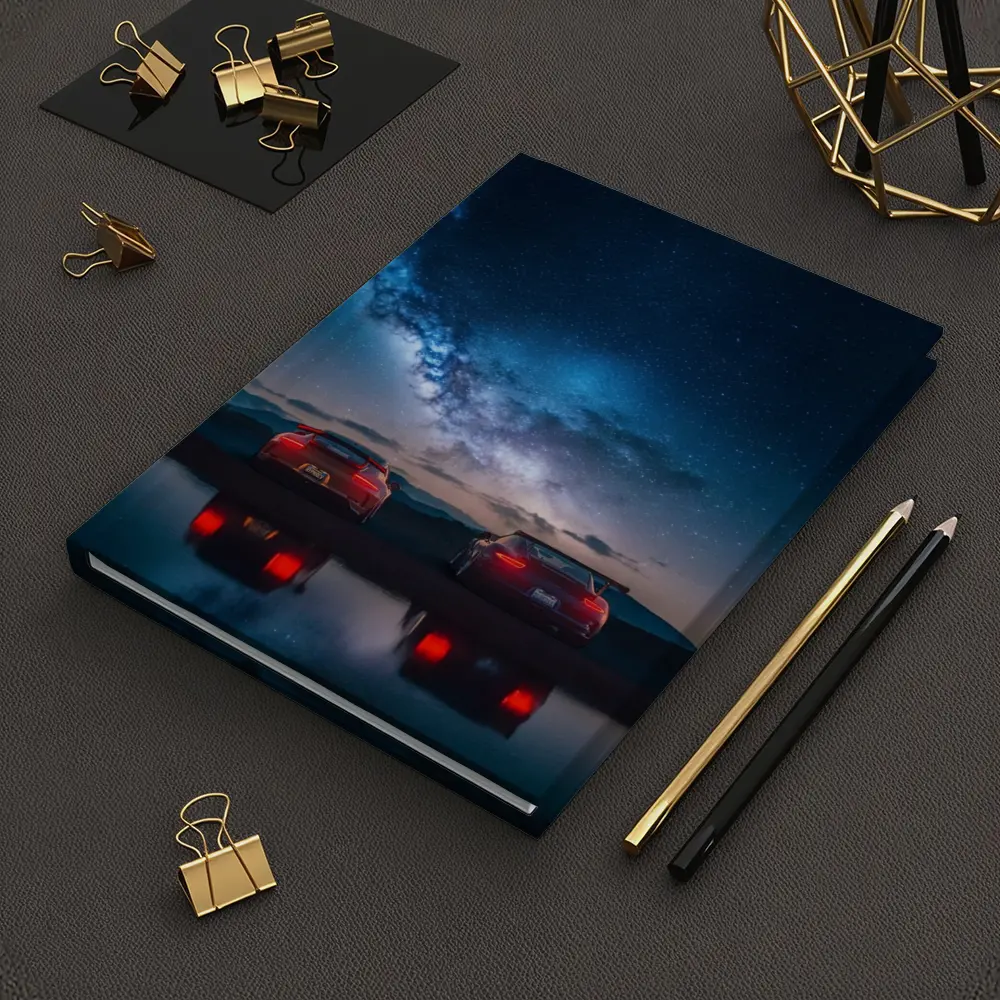 Two Red Porsche 911 Under Milky Way – Notebooks