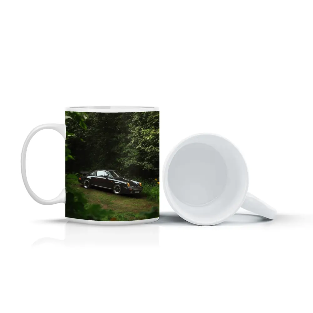 Black Porsche 911 Parked in Green Forest – Mugs