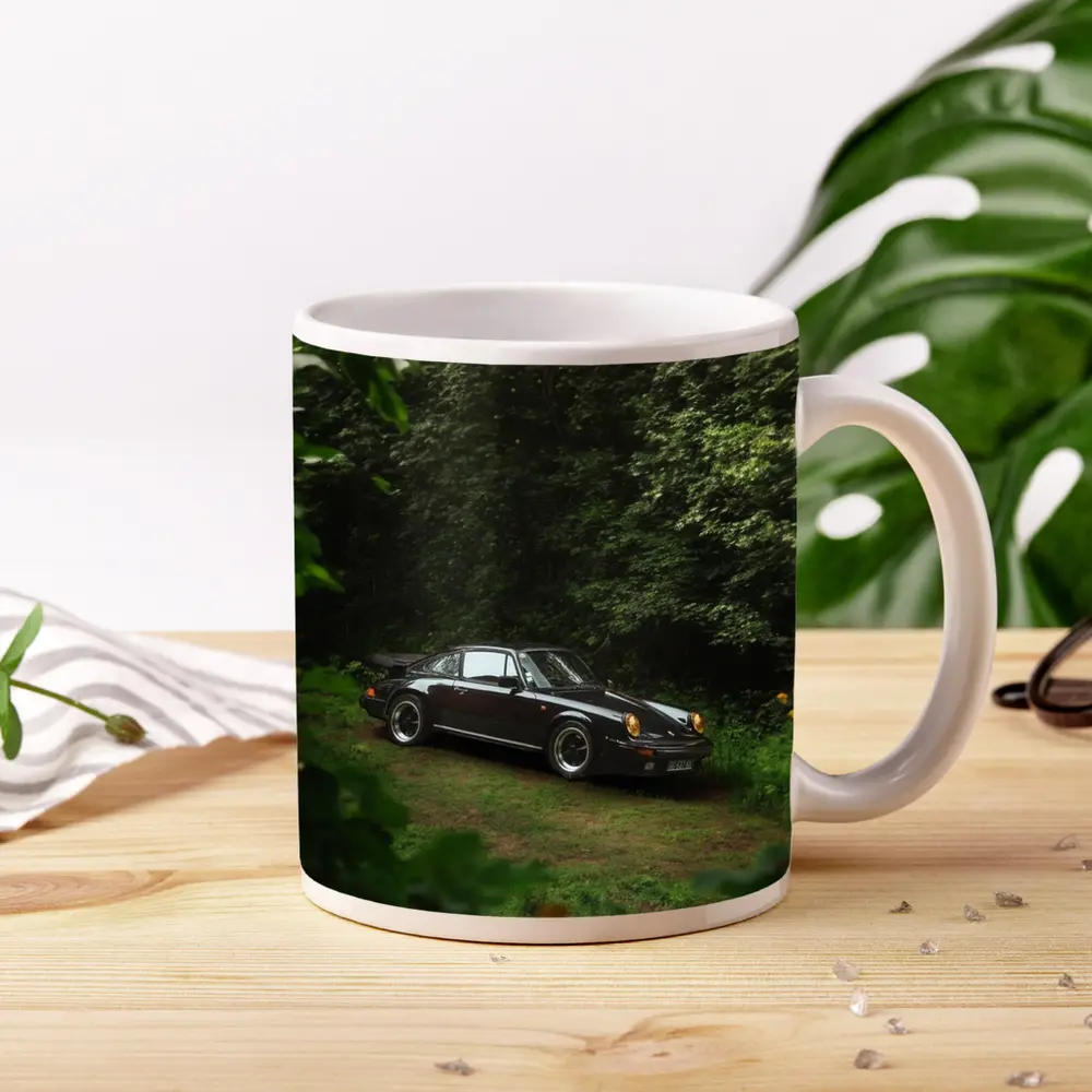 Black Porsche 911 Parked in Green Forest – Mugs