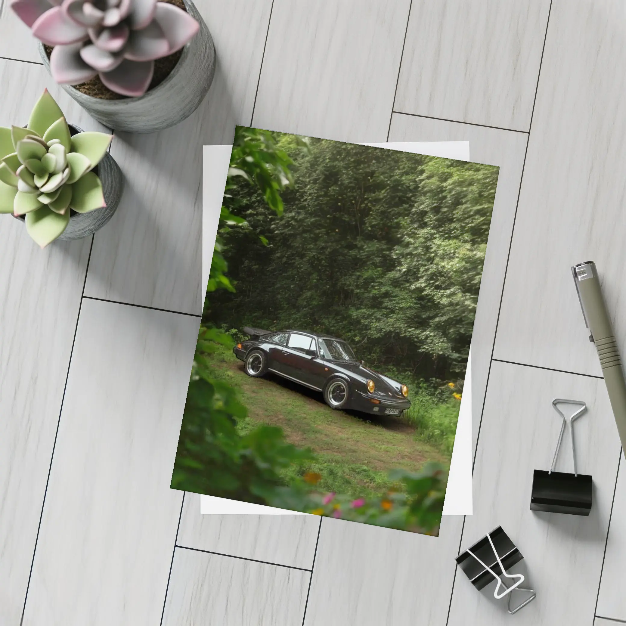 Black Porsche 911 Parked in Green Forest – Postcards