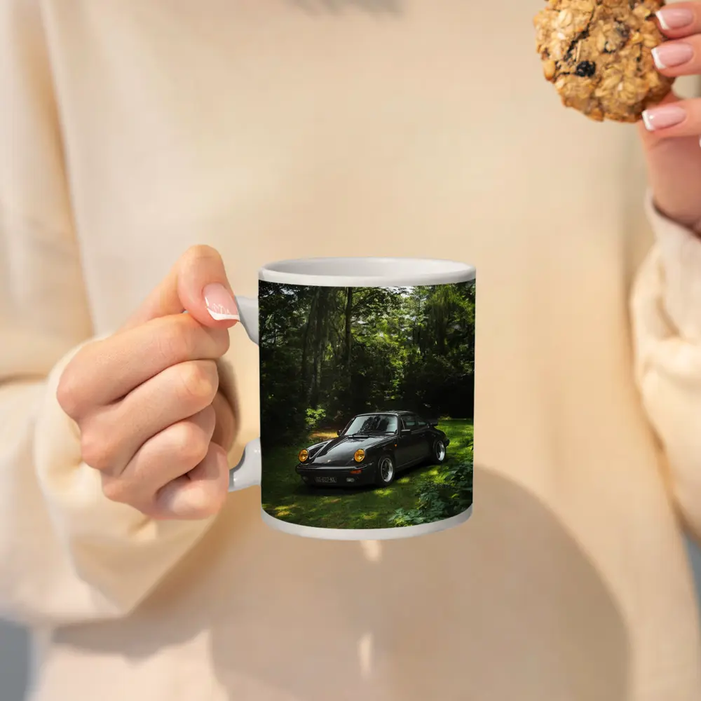 Black Porsche 911 Parked in Green Forest – Mugs