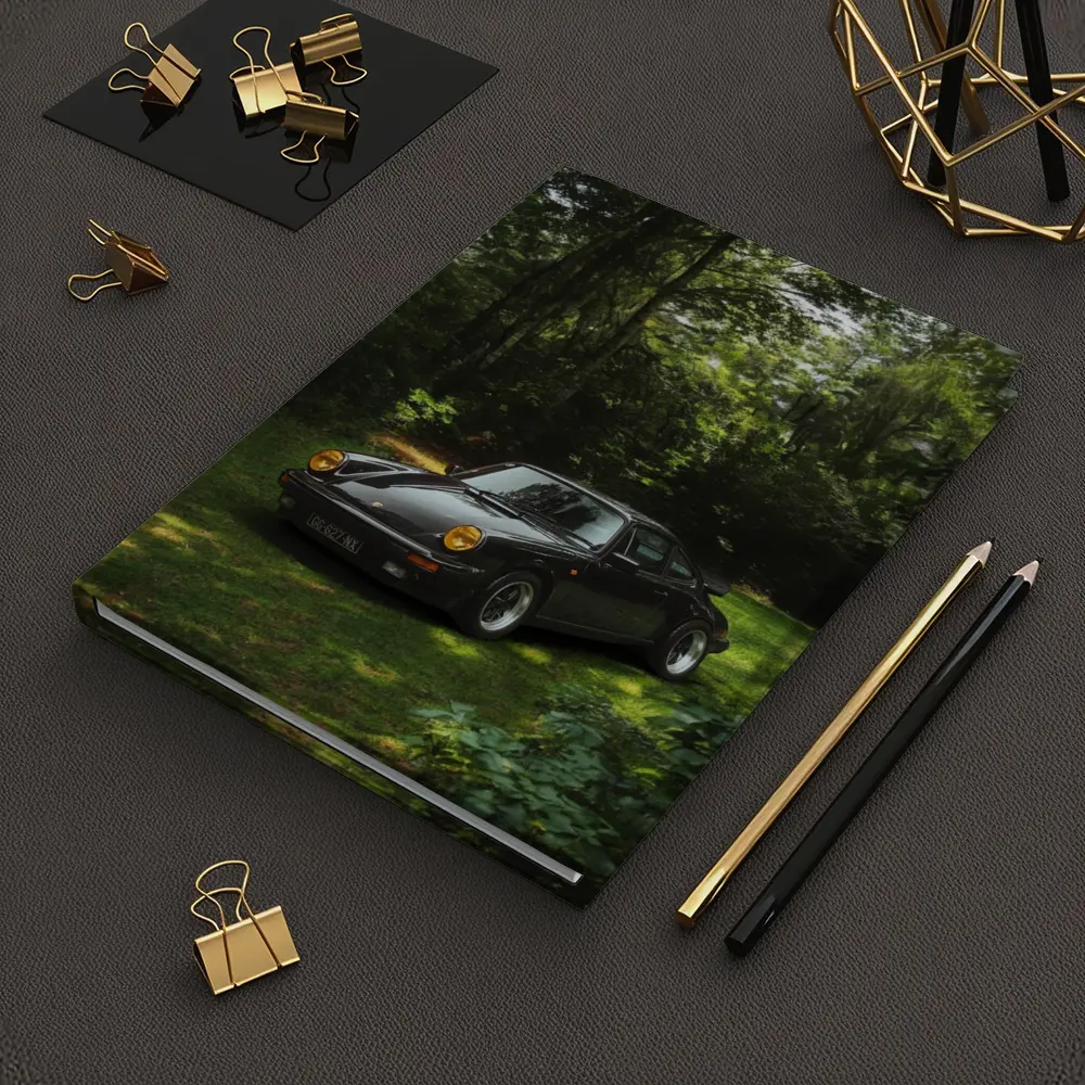 Black Porsche 911 Parked in Green Forest – Notebooks